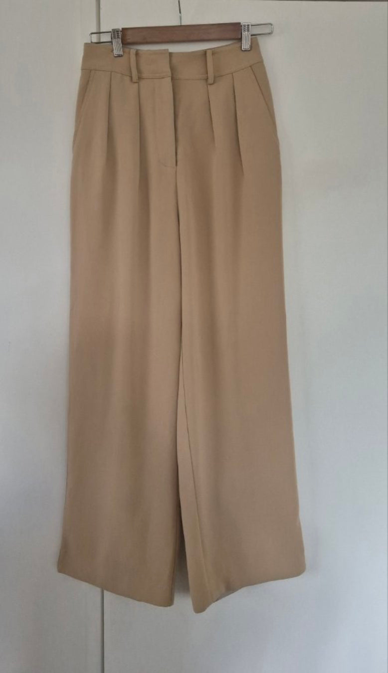 Front view of By Johnny. Camel Pants Size 8, preloved designer clothing at Copper & Cotton
