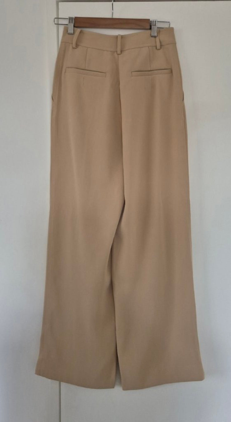 Back view of By Johnny. Camel Pants Size 8, preloved designer clothing at Copper & Cotton
