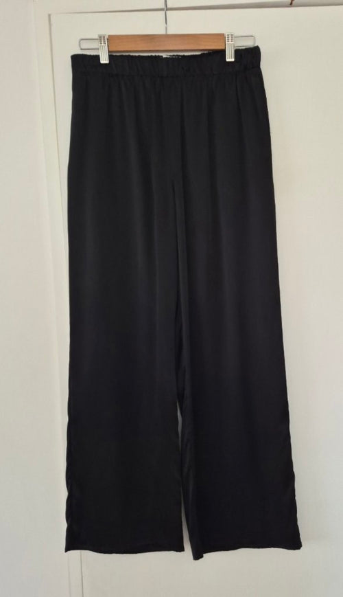 Front view of Caitlin Crisp Black Silk Pants Size 10, preloved designer clothing at Copper & Cotton